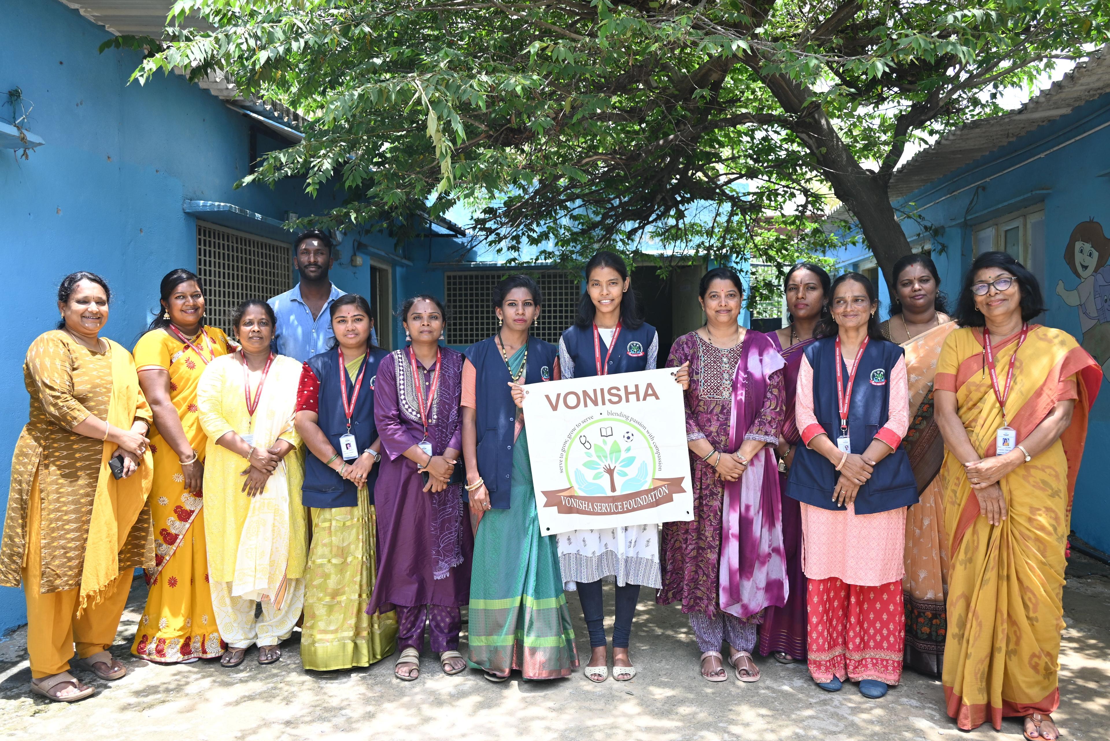 Volunteer Group Photo In Education Centre